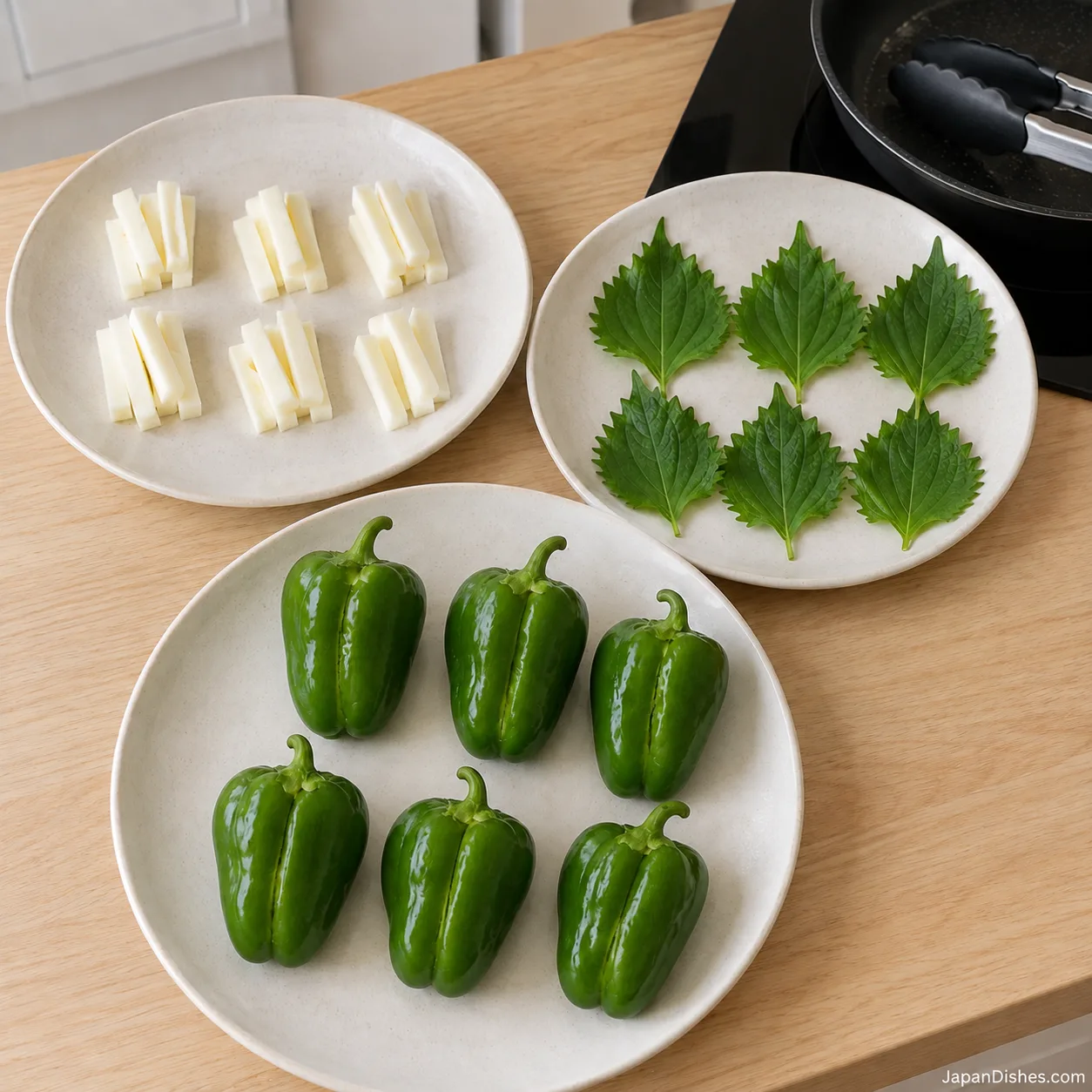 Six mozzarella portions, six shiso leaves and six slit green peppers